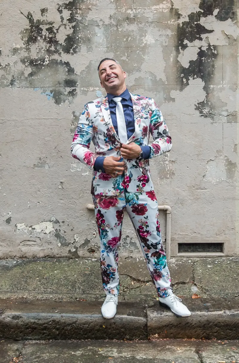 Johan the Celebrant & MC in his signature floral suit ready to bring joy to every wedding celebration!